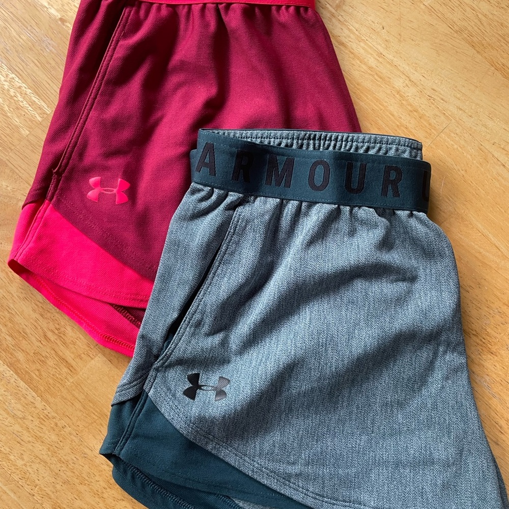 2 pairs medium Under Armour loose fit athletic shorts.